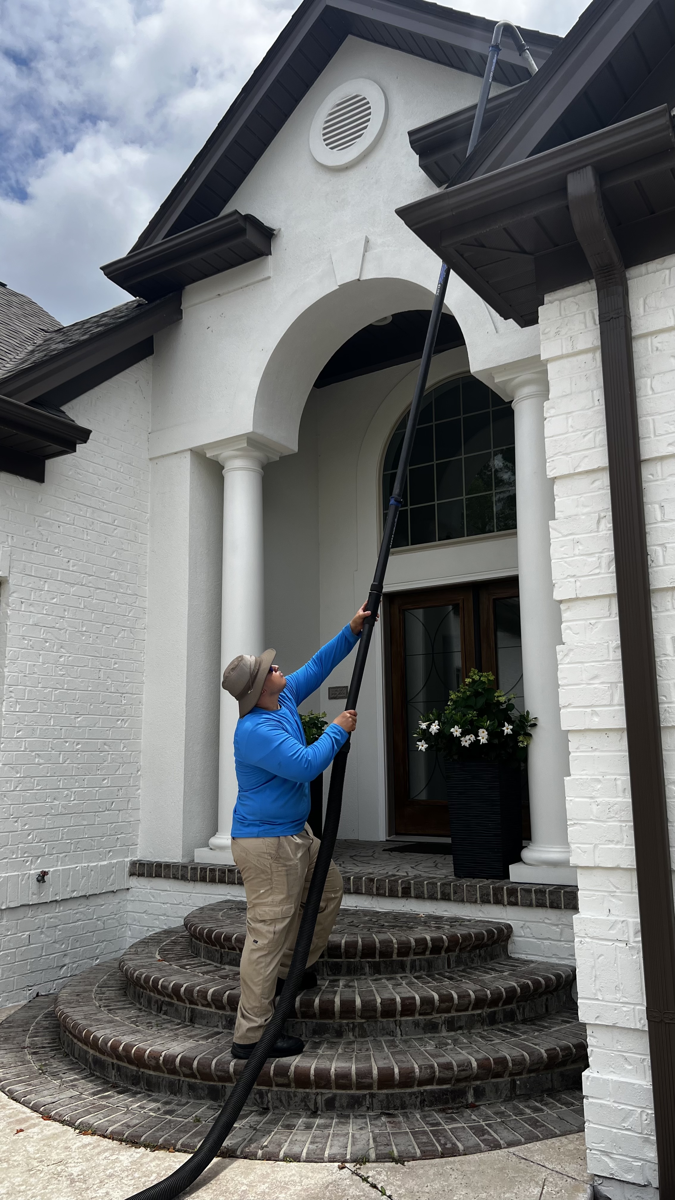 Nick providing professional gutter cleaning service